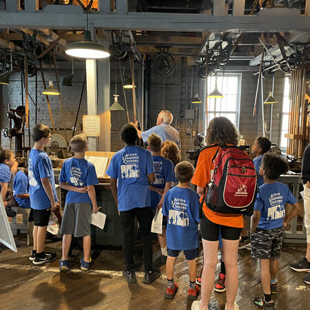 in front of machine shop 2 - group tours