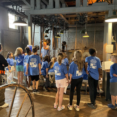 in front of machine shop - group tours